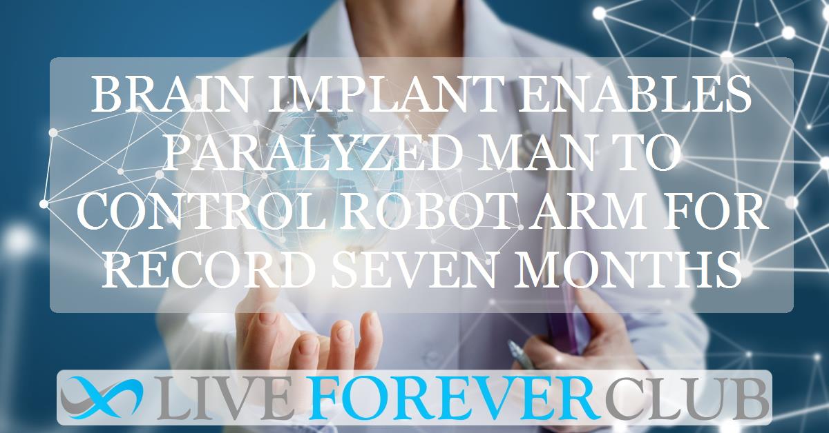 Brain implant enables paralyzed man to control robot arm for record seven months